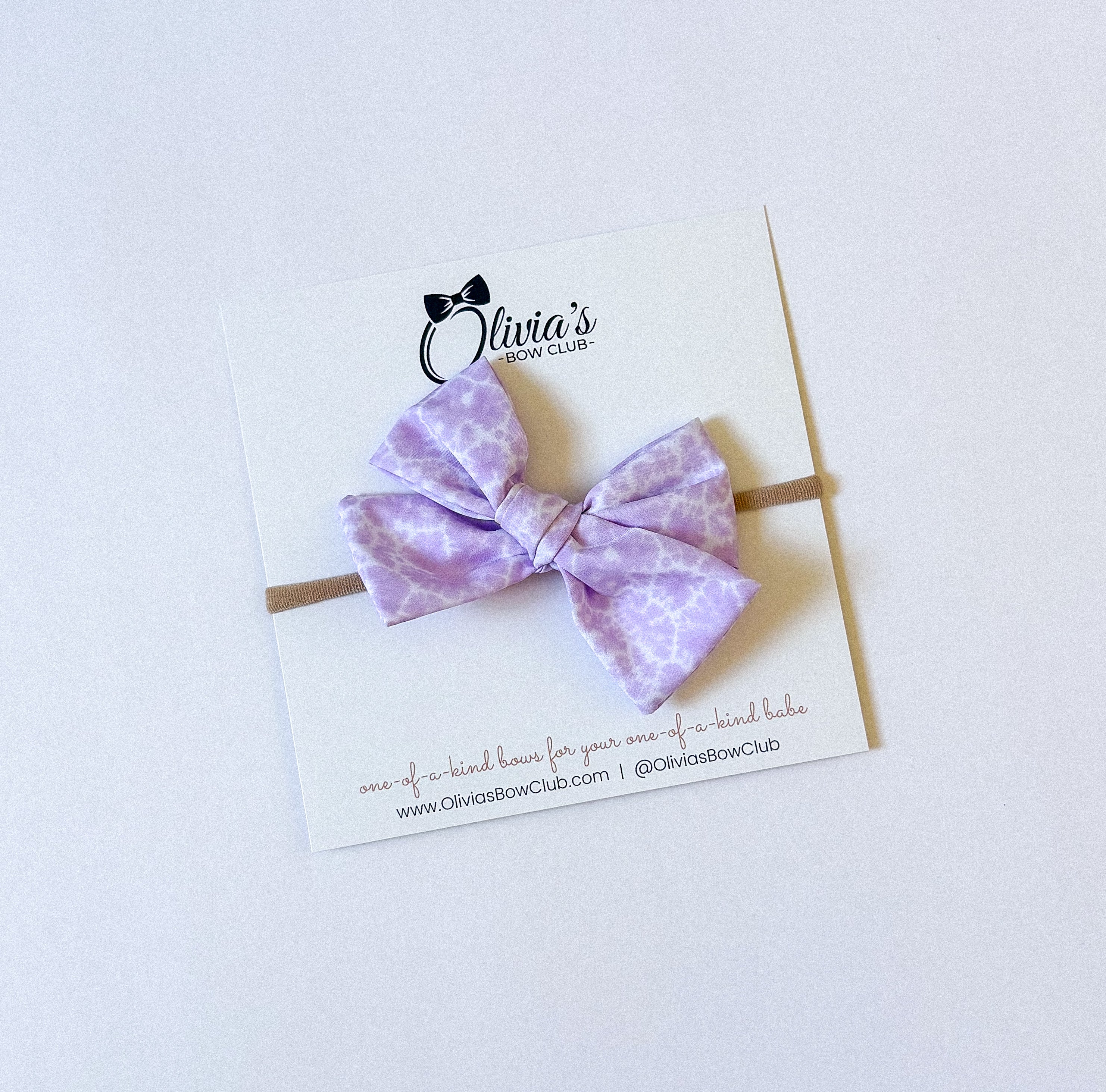 The Feature Olivia Bow