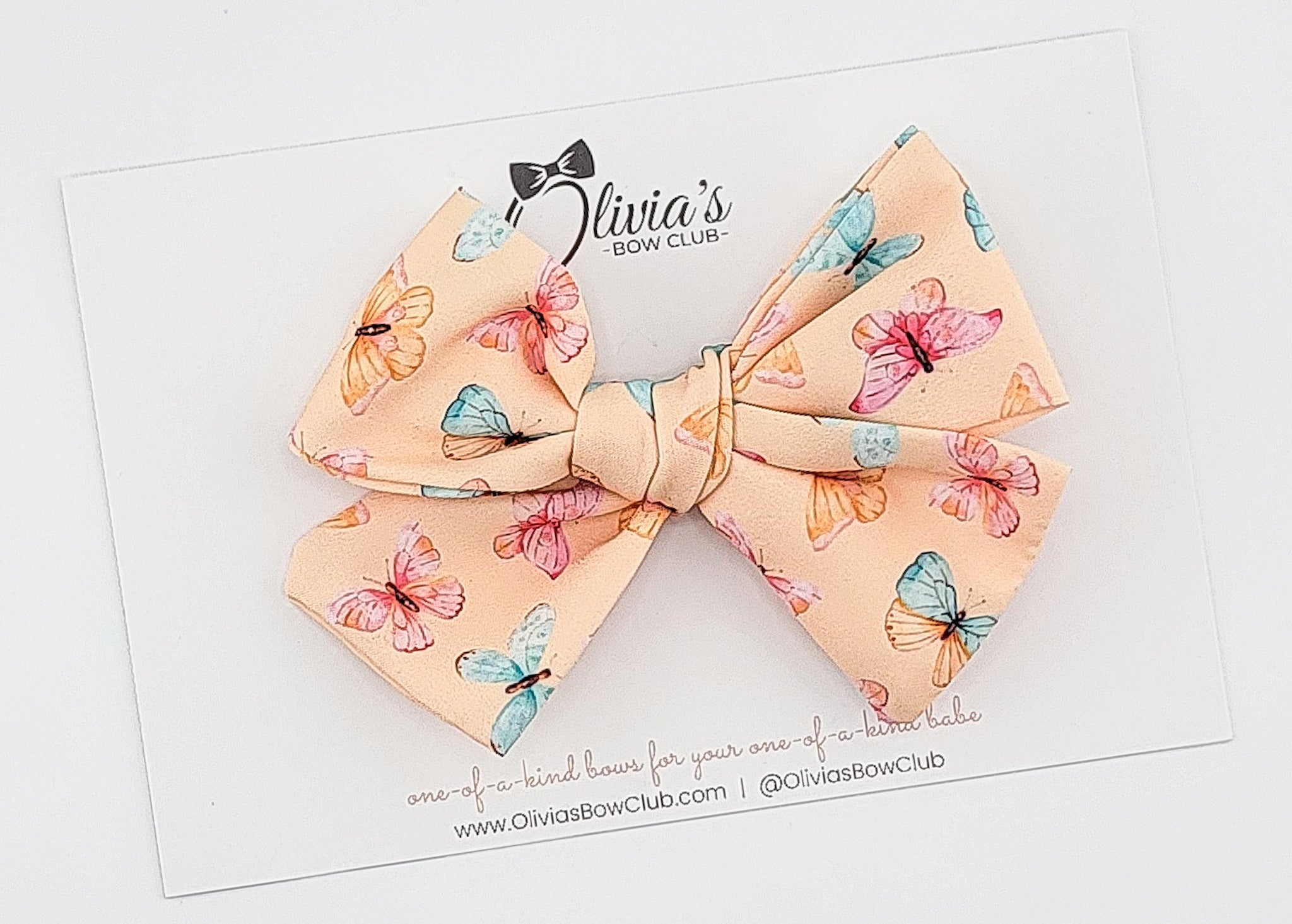The Feature Olivia Bow