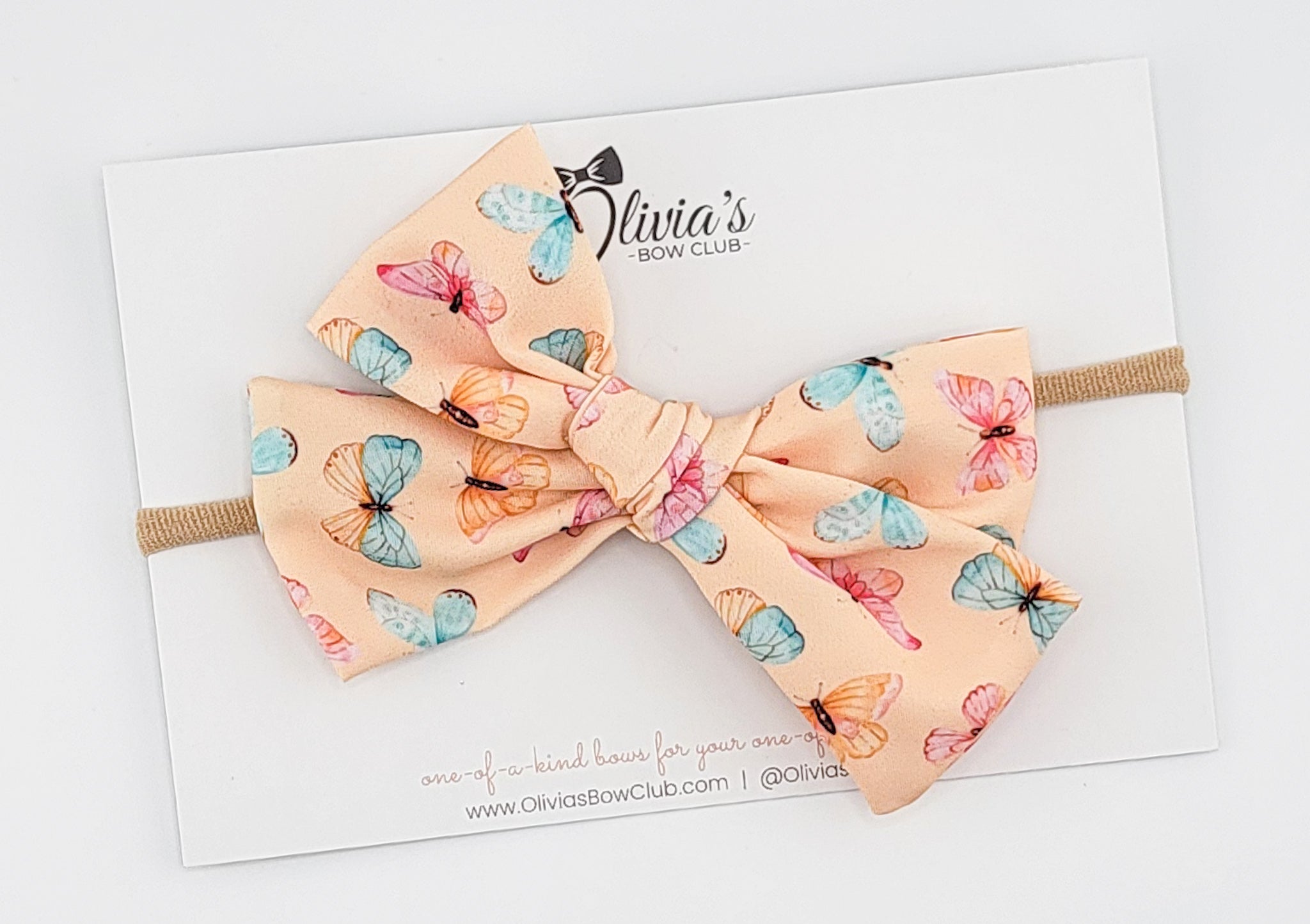 The Feature Olivia Bow